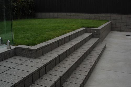 Fire Ash Steps. Anything Is Possible With Honed Masonry. Grey Coloured Capping Blocks Were Used To Make These Steps.
